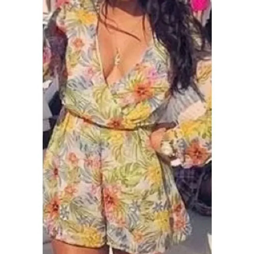 Glamorous floral romper size L